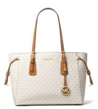 Jet-Set Elegance: Michael Kors Voyager - 10A Quality